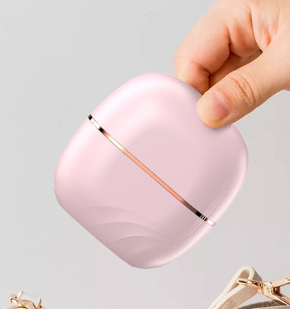 Trådløs 2 i 1 mini rettende hårbørste.